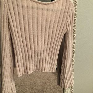 Boutique cropped sweater with open back